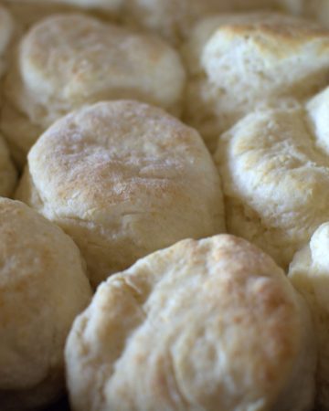 Skillet full of fluffy biscuits