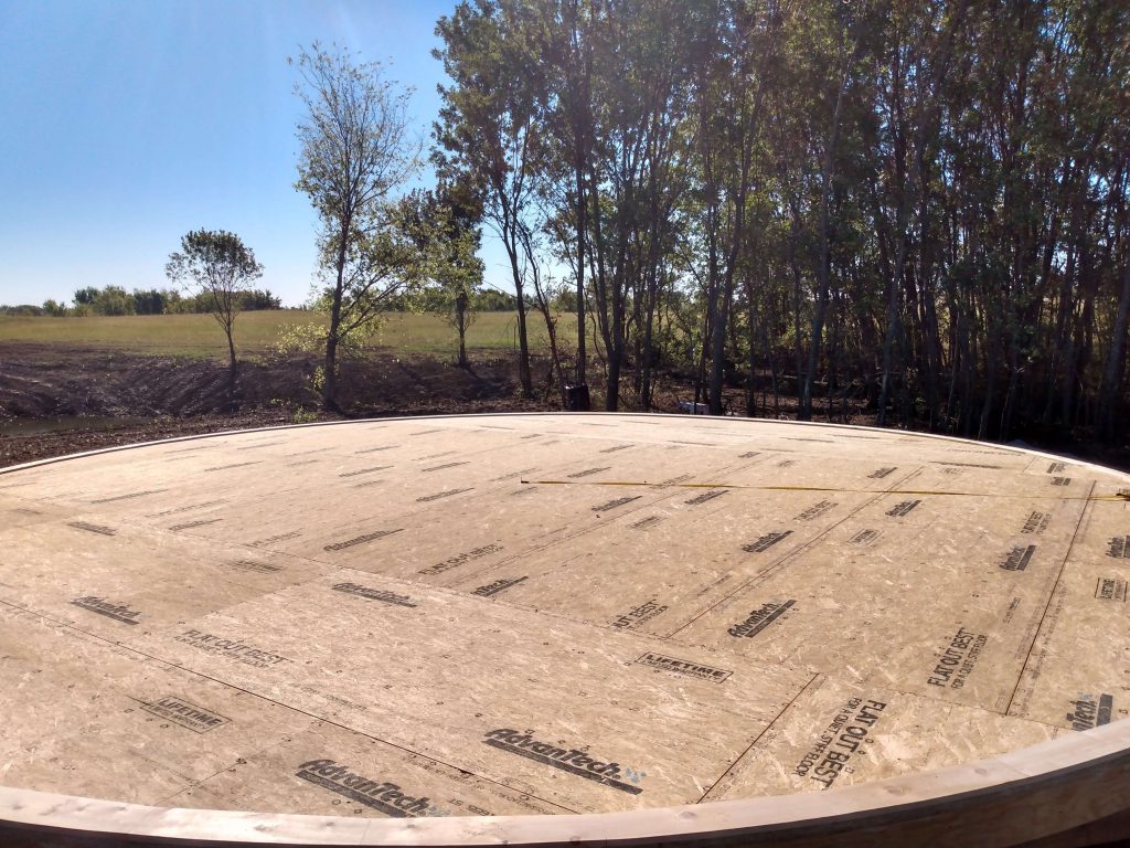 Round platform with trees in the background